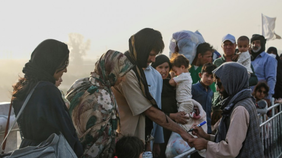 Afghans show solidarity as migrant returns from Iran surge