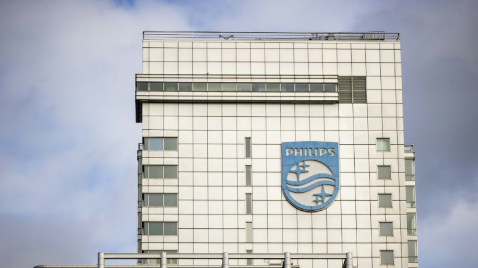 Philips turns in a profit but China, tariffs weigh