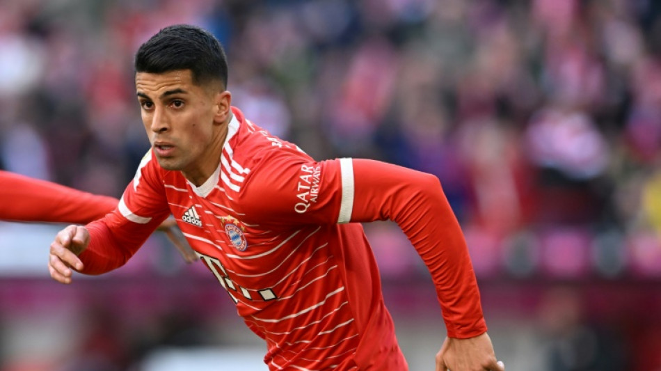 Pavard double sends Bayern three points clear