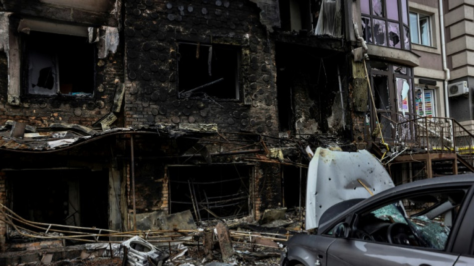 Bodies litter Ukraine town's street of death