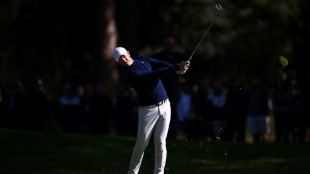 McIlroy five shots off European PGA lead after finding water on 18th