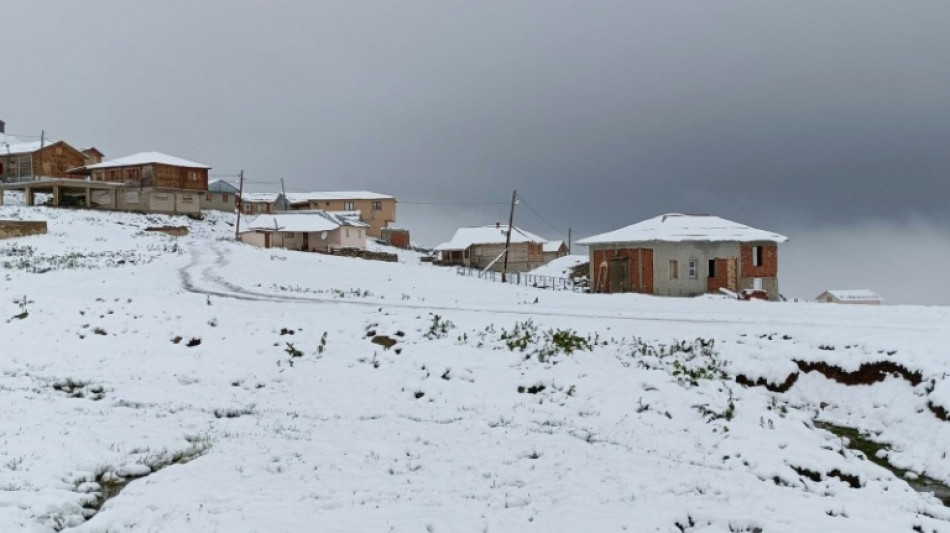 Heavy snow hits Turkey's northeast as southwest burns