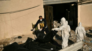 Organiza&ccedil;&atilde;o de socorristas s&iacute;rios encontram corpos e vest&iacute;gios de ossos perto da capital