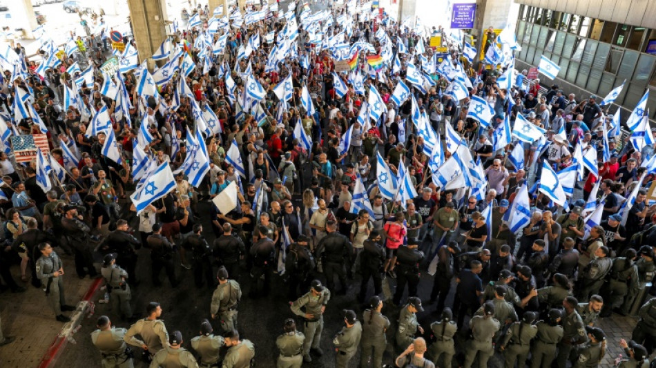 Israel protesters up resistance after judicial clause voted through