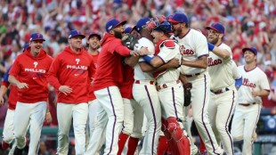 Phillies oust Braves, Astros sweep Seattle in MLB playoffs
