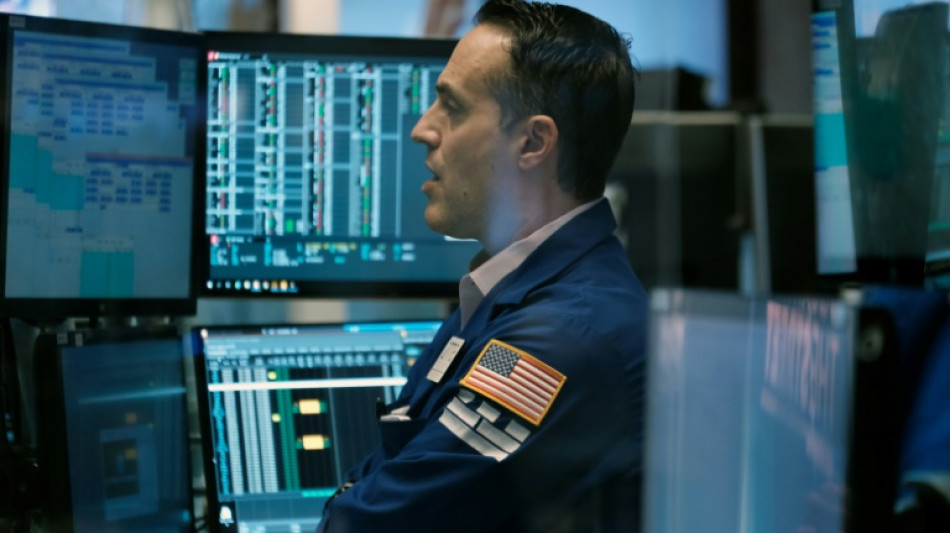Wall Street ouvre en baisse, plus marqu&eacute;e par l'Ukraine que par la Fed
