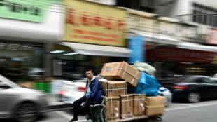 Trumps Z&ouml;lle: Chinesische H&auml;ndler auf einer Messe in Shanghai suchen Auswege 