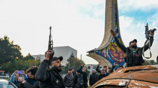 S&iacute;rios dentro e fora do pa&iacute;s celebram a queda de Bashar al-Assad