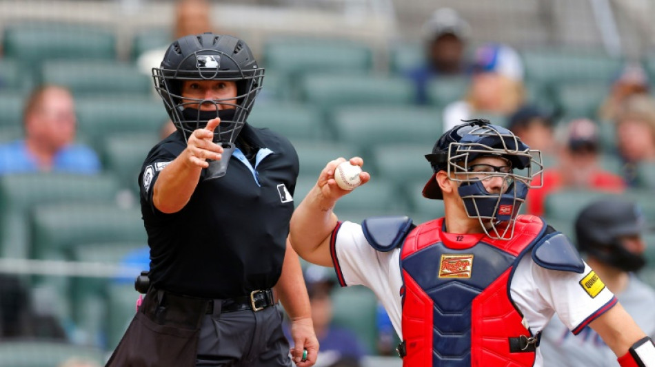 Pioneering MLB umpire Pawol debuts behind plate in Braves win