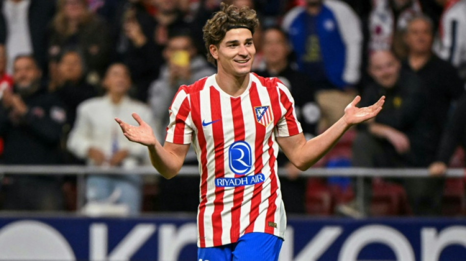 Alvarez hat-trick helps Atletico edge Rayo thriller