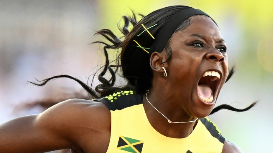 Jackson edges Fraser-Pryce to win world 200m gold