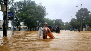 Record Vietnam rains kill four and flood 100,000 homes