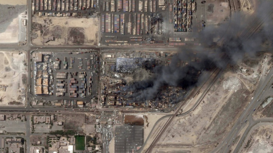 Iran says fire contained after deadly blast at key port