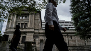 Stock markets diverge after central bank rate hikes
