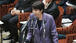 Japan ruling party approves plans to beef up intelligence