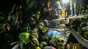 Colombia rescuers find woman alive as quake death toll passes 200