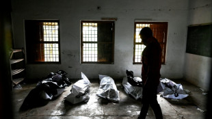 La sinistre qu&ecirc;te d'&ecirc;tres chers parmi les morts de la catastrophe ferroviaire en Inde 