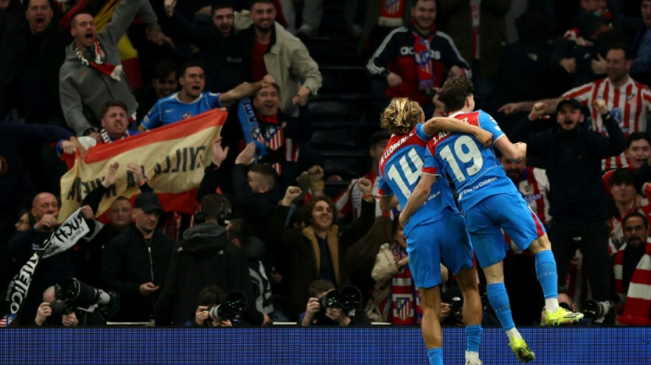 Atletico survive Spurs scare to reach Champions League quarters