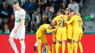 Lewandowski hits brace in Barca cruise, Sevilla earn crucial win