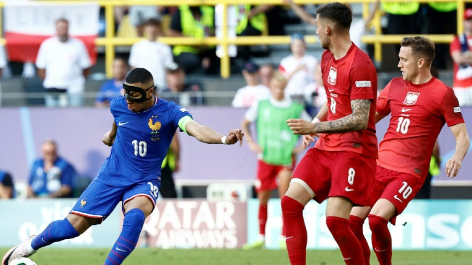 Fran&ccedil;a avan&ccedil;a &agrave;s oitavas da Euro como segunda ap&oacute;s empate (1-1) com a Pol&ocirc;nia