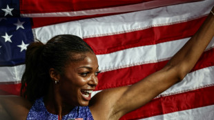 Injured Olympic 200m champion Thomas out of Worlds 