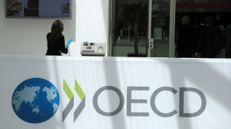 OECD hebt Wachstumsprognose f&uuml;r Weltwirtschaft und warnt vor Protektionismus