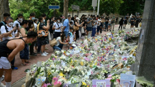Hong Kong: longue file d'attente pour un dernier hommage &agrave; Elizabeth II