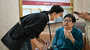 'Companions' ease pain of China's bustling, bamboozling hospitals