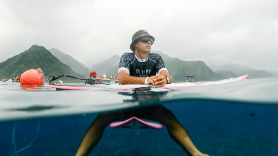 'Backs to the Wall' for surfing's cancer survivor Flores 