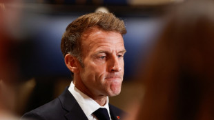 Protests banned in parts of Paris as Macron swipes at Trump 