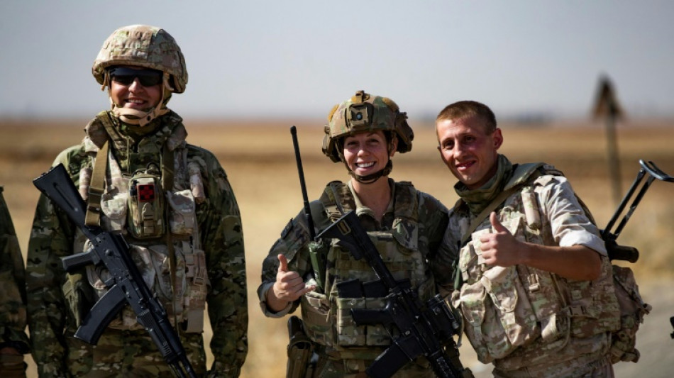 En Syrie, soldats russes et am&eacute;ricains partagent un rare moment de convivialit&eacute;
