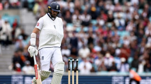 England's injured Woakes still has Ashes hopes