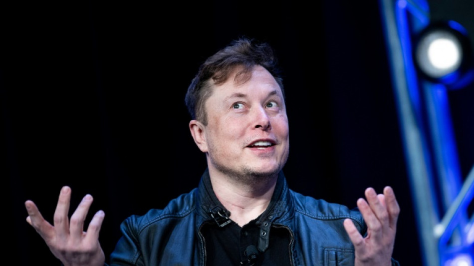 Musk says deal to buy Twitter 'temporarily on hold'