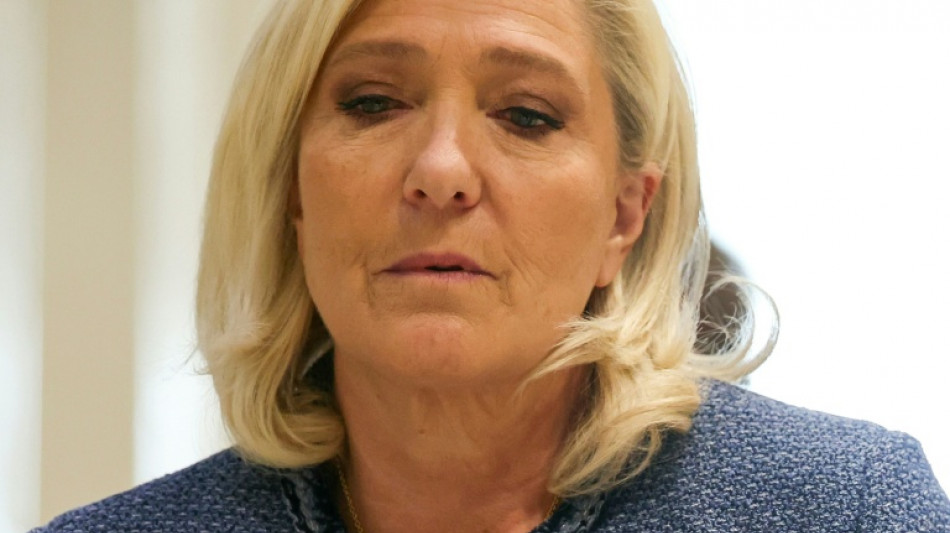 France's Le Pen seeks to keep presidency hopes alive after election ban