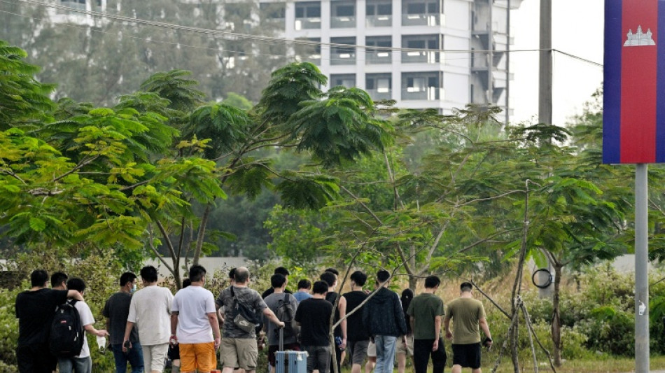 Fraudsters flee Cambodia's 'scam city' after accused boss taken down