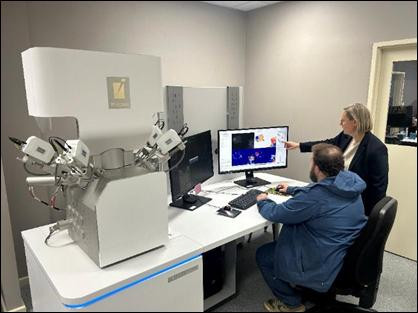 A person and person working on a computer AI-generated content may be incorrect.