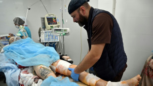 A Kiev, des soldats ukrainiens miracul&eacute;s de la pluie de bombes russes