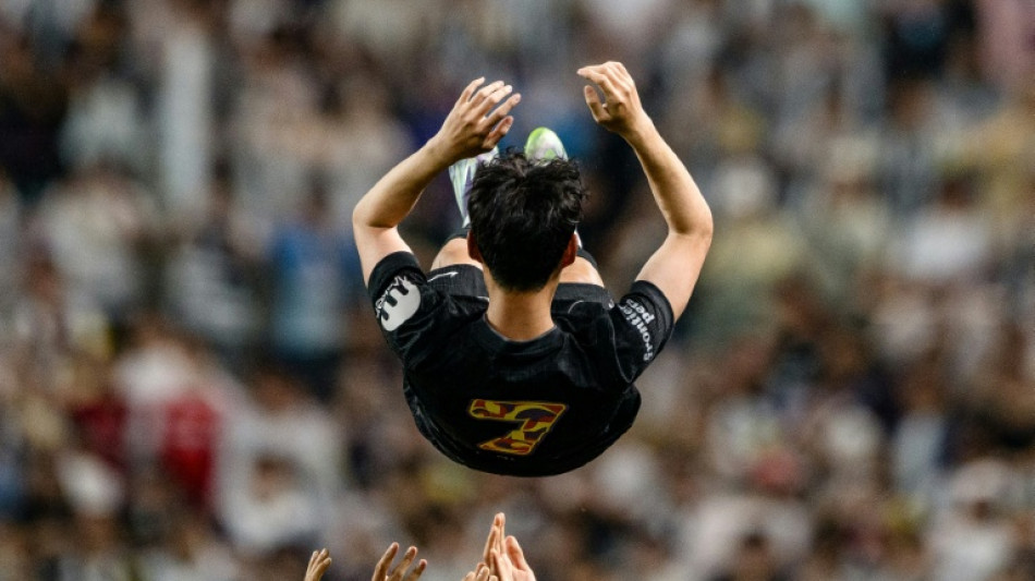 Departing Spurs captain Son in tears on emotional evening