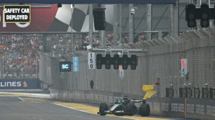 Verstappen wins chaotic Singapore sprint after Russell crashes