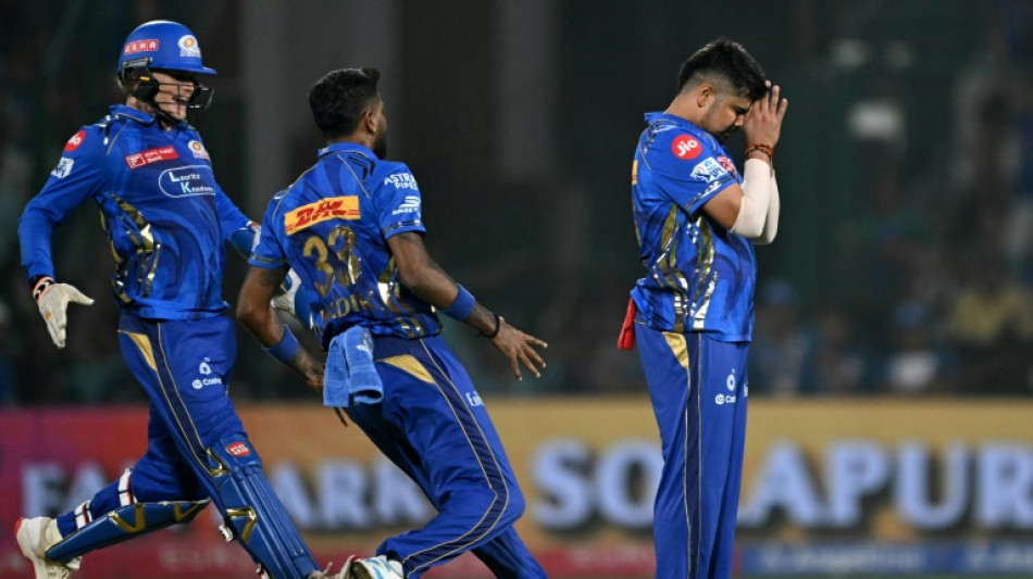Kohli, Karn star as Bengaluru and Mumbai win in IPL
