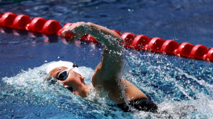 Canada's McIntosh breaks 400m medley world record