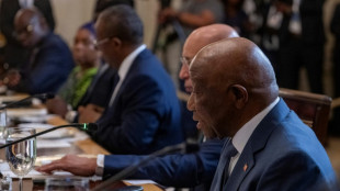 Trump praises Liberian leader on English - his native tongue