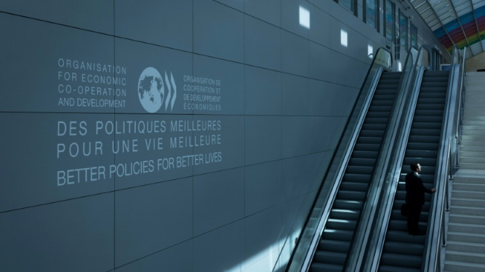 OECD raises world growth outlook as tariffs contained, for now