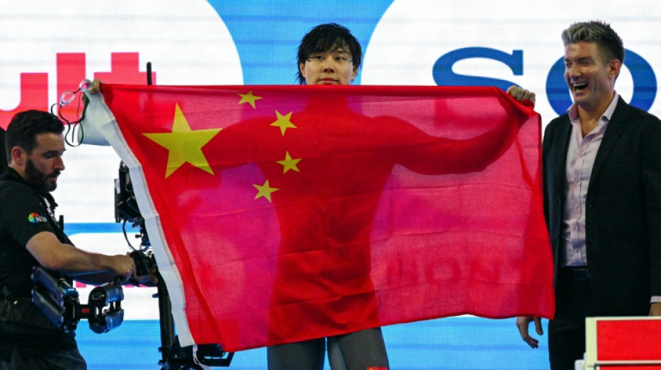 Qin beats Olympic champ Martinenghi for 100m breaststroke world gold