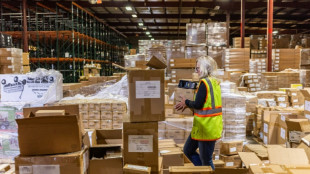 US producer inflation unexpectedly falls in first drop since April