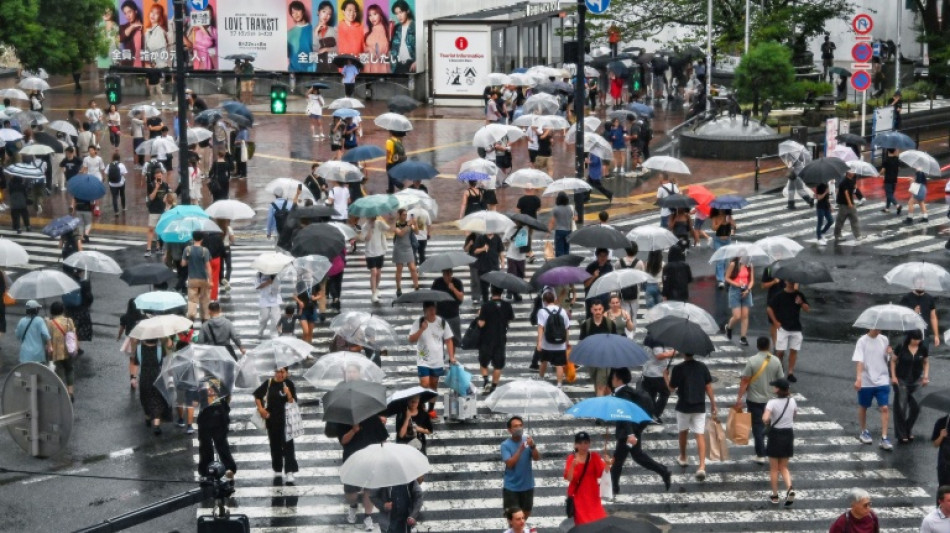 Japan's Nikkei leads big losses in Asian markets as gold hits record