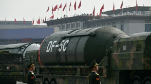 Beijing shows off drones, missiles and lasers in military parade