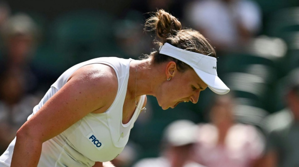 Krejcikova battles back against rising star Eala to win Wimbledon opener